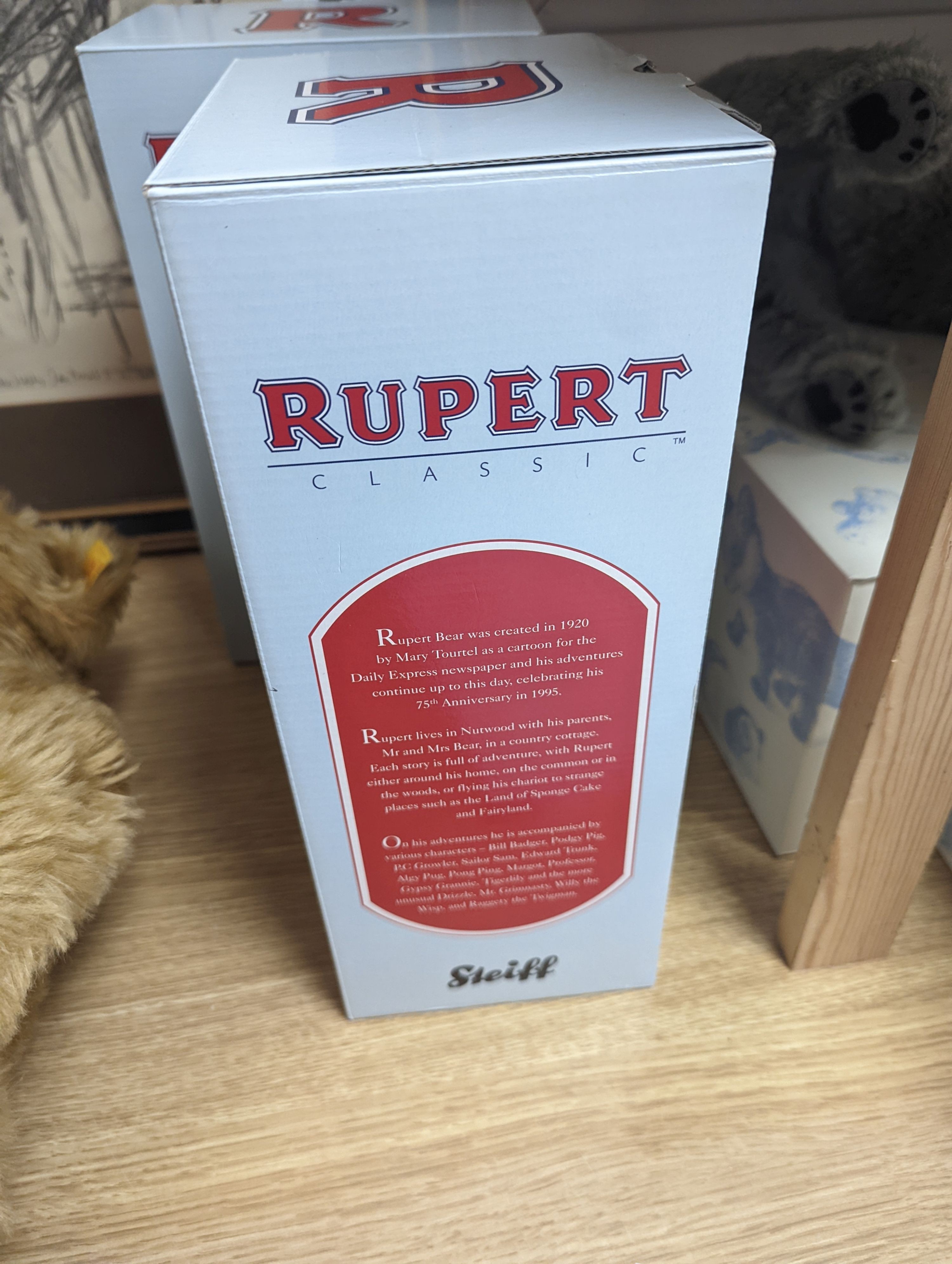 Steiff Classic 1903 bear with Steiff Limited Edition 'Algy' Pug from Rupert Series with Steiff Limited Edition 'Bill the Badger', Rupert Series both with box and certificate, bear 47 cms high.